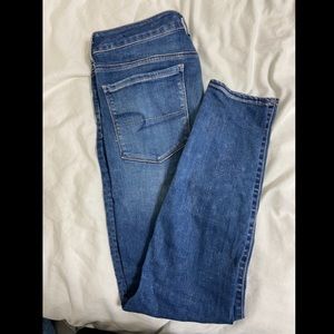 American Eagle Medium Wash Hi-Rise Super Stretch Jeggings. Size 12